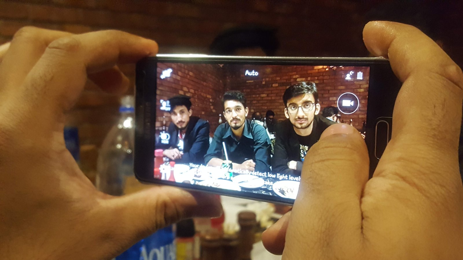 Smartphone being used for photography in a real-world setting